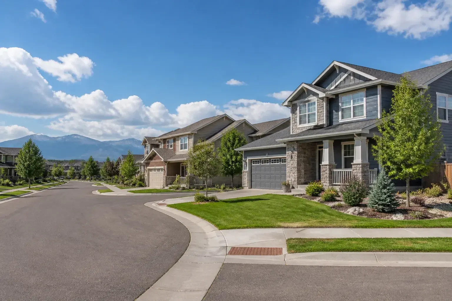 Firestone suburban street with modern homes.